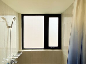 Deluxe Apartment | Bathroom | Shower, towels, shampoo - Modern And Homey 2Br At Meikarta Apartment (Cikarang)