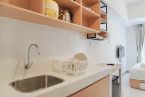 ดีลักซ์อพาร์ทเมนท์ | ครัวส่วนตัว | เตาประกอบอาหาร, หม้อหุงข้าว, เครื่องครัว/จาน/ช้อนส้อม