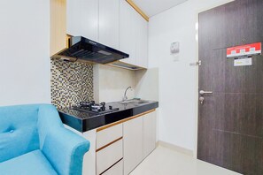 Deluxe Apartment | Private kitchen | Full-size fridge, stovetop, rice cooker, cookware/dishes/utensils - Best Deal And Comfortable 2Br Serpong Garden Apartment (Cisauk)