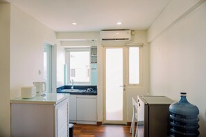 Private kitchen - Comfy And Modern Studio At Kebagusan City Apartment (Jakarta)