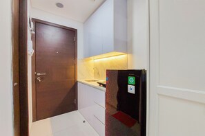 Private kitchen - Best Homey And Nice Studio At Pacific Garden Apartment (Tangerang)
