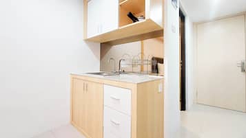 Apartamento luxo | Cozinha privada | Geladeira grande, cooktop, panela elétrica de arroz