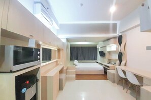 Deluxe Apartment | Living area - Best Homey And Modern Studio At Uttara The Icon Apartment (Depok)