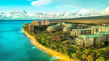 On the beach, sun loungers, beach towels