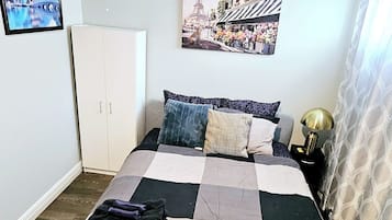 2 habitaciones, tabla de planchar con plancha y wifi gratis