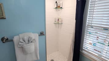 Hair dryer, towels, soap, shampoo