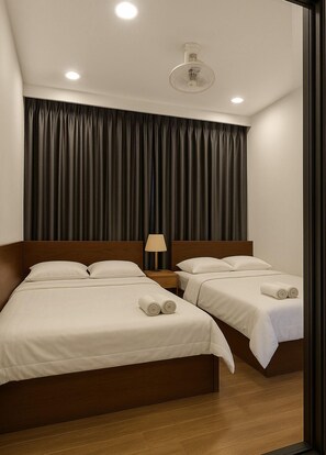 Deluxe Quadruple Room | Premium bedding, down duvets, pillow-top beds, minibar - Ngoc Hoa Nam Hoi An Hotel (Da Nang)