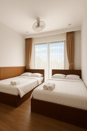 Deluxe Quadruple Room | Premium bedding, down duvets, pillow-top beds, minibar - Ngoc Hoa Nam Hoi An Hotel (Da Nang)