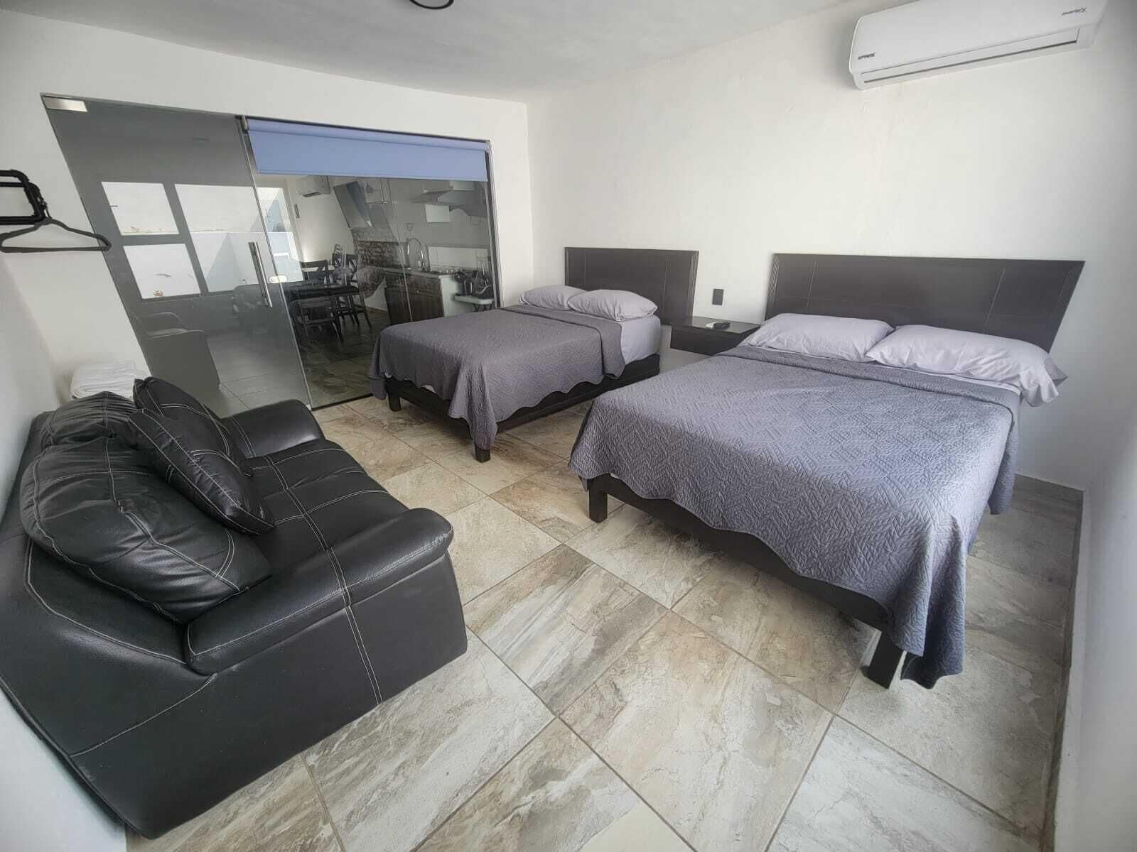 Suíte família | Roupas de cama premium, edredons de pluma, camas Select Comfort