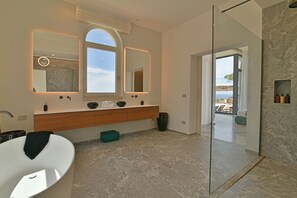 Shower, eco-friendly toiletries, hair dryer, bidet