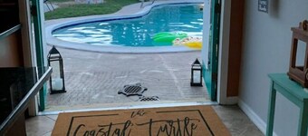 Quaint Coastal Pool Home Oasis Florida Space Coast, by Beach&Space Coast Stadium