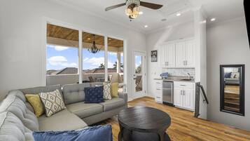 House, Multiple Beds, Hot Tub, Garden View | Living area | 50-inch TV with digital channels