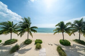 On the beach, sun-loungers, beach towels