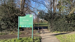A park entrance sign with contact information and services like grass cutting and hedge trimming. - Big Loft in the Heart of Cheam Village (35 min from London City) (Sutton)
