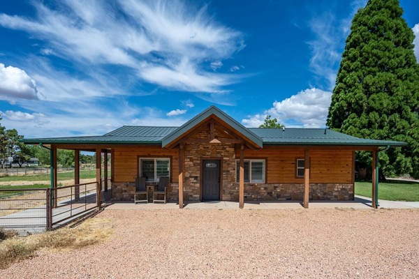 Dive into relaxation at Sequoia Homestead! Our 2BR/2BA pet-friendly home in Kanab features a heated pool, a playground for the kids, and all the comforts of home.