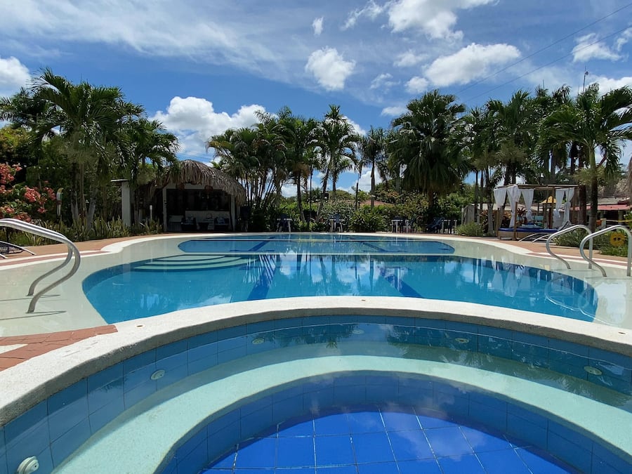 Outdoor pool, open 9:00 AM to 9:00 PM, free cabanas, pool umbrellas