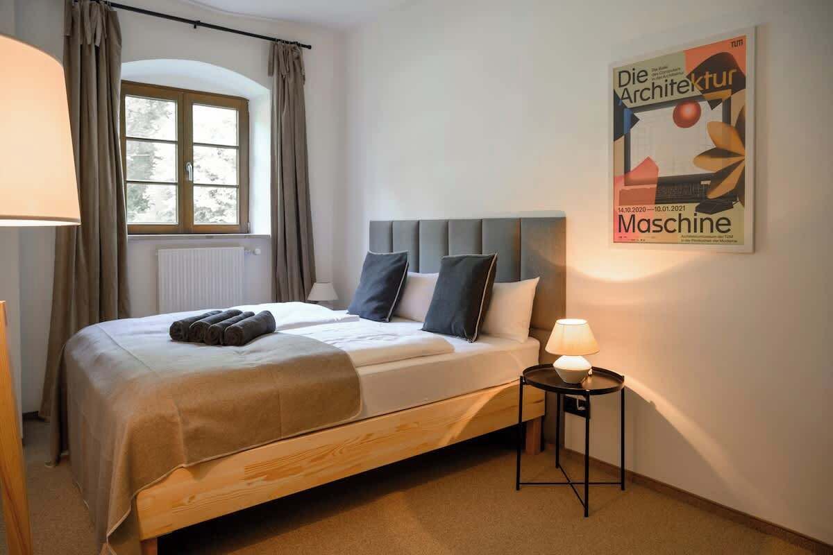 Bedroom 5 - Queen sized bed with garden view.