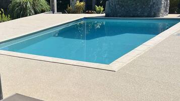 Basic Quadruple Room, Shared Bathroom, Garden View (Chambre) | Outdoor pool