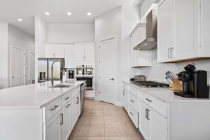 Fridge, microwave, oven, stovetop - Fairway Magic: Themed Bedroom, Theater, Games Loft, Private Pool, Water Park, Near Disney (Kissimmee)