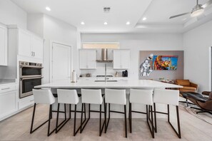 Fridge, microwave, oven, stovetop - Fairway Magic: Themed Bedroom, Theater, Games Loft, Private Pool, Water Park, Near Disney (Kissimmee)