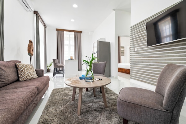 Luxury Apartment | Living area | 50-inch Smart TV with digital channels, TV, Netflix