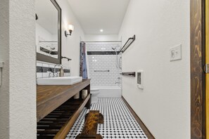 Shower, eco-friendly toiletries, hair dryer, towels