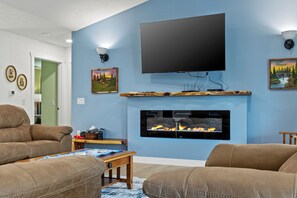 Smart TV, chimenea, videojuegos, reproductor de DVD