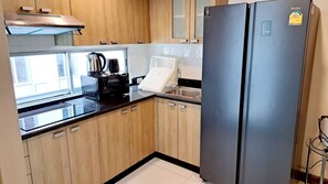 Fridge, microwave, stovetop, coffee/tea maker