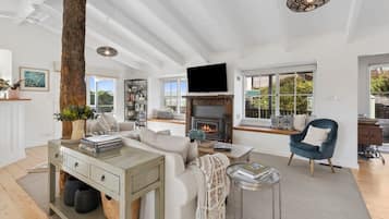 TV, fireplace, books, offices