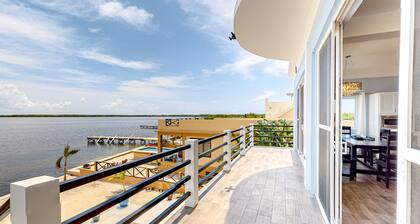 Ocean view stay with a balcony, private pool, full kitchen, AC, and washer/dryer