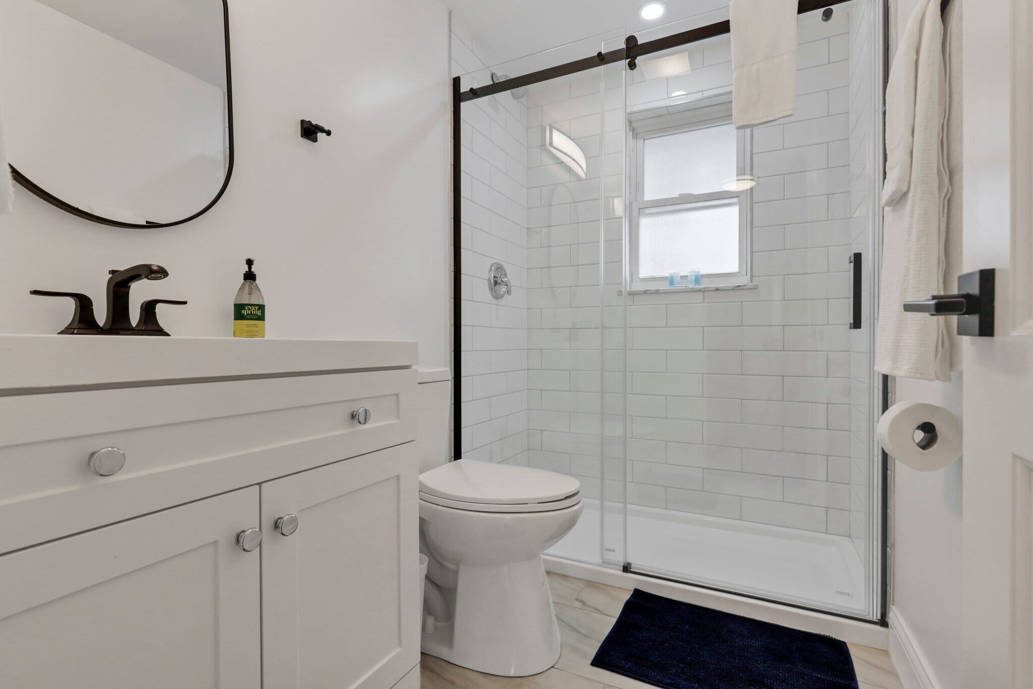 Shower, hair dryer, towels