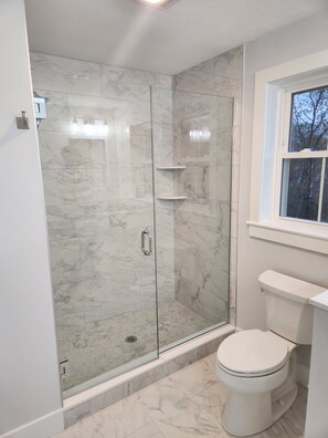 Hair dryer, towels, soap, shampoo