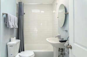 Combined shower/tub
