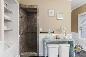 Bathtub, hair dryer, towels