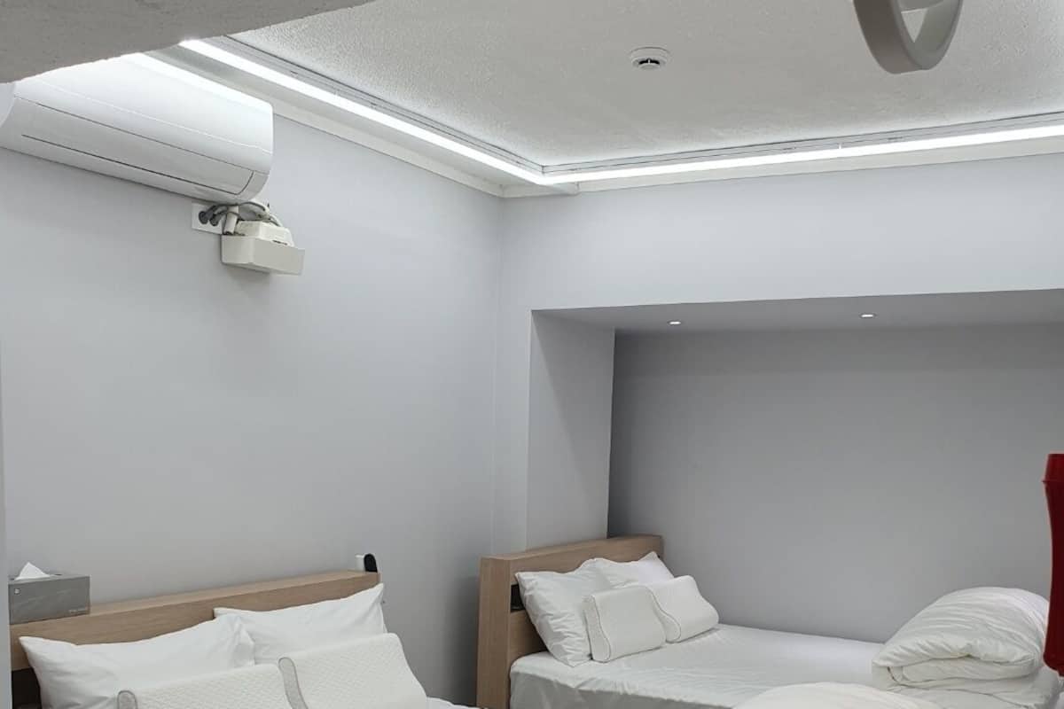 Deluxe Family Room 101 | 2 bedrooms, premium bedding, down comforters, pillowtop beds