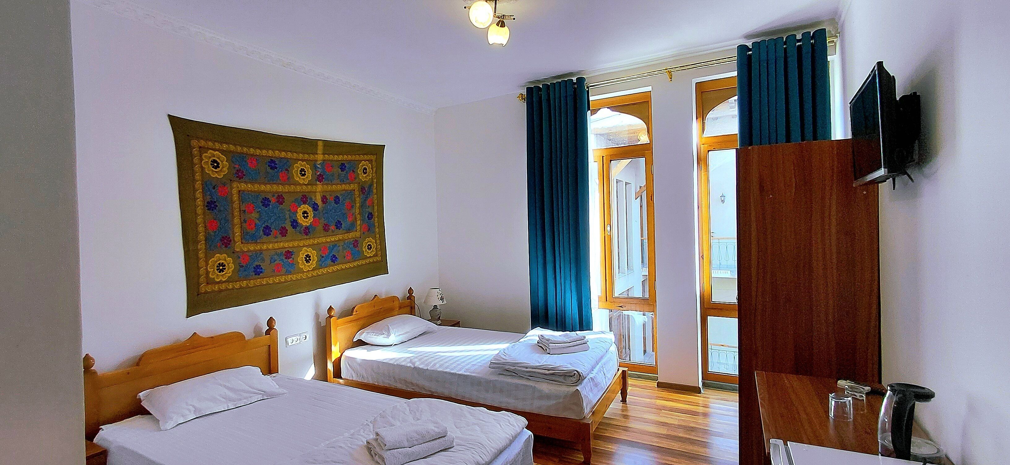 Habitació doble o amb dos llits individuals superior | Llençols de cotó egipci, roba de llit d'alta qualitat i cobrellits 