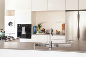 Appartamento | Cucina privata | Frigorifero, microonde, forno, piano cottura