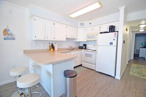 Fridge, microwave, oven, stovetop - Marigot Beach 705-Oceanfront 101st St, Free WiFi, Pool, Elev, W/D, AC (Ocean City)