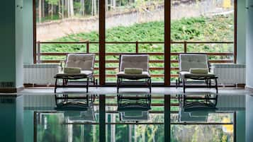 Indoor pool, pool umbrellas, sun loungers