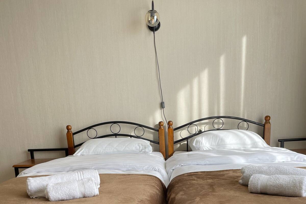 Standard İki Ayrı Yataklı Oda | Ses yalıtımı, ücretsiz kablosuz İnternet, çarşaf takımı