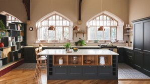 A spacious kitchen with high ceilings, large windows, and a central island. - Wesleyan, Bolton Abbey Estate (Barden)