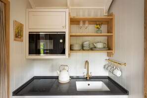 Fridge, microwave, dining tables