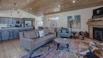 Luxury Chalet, 3 Bedrooms, Mountain View | Living room | 42-inch TV with cable channels, fireplace