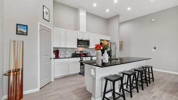 Fridge, stovetop, coffee/tea maker