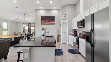 Fridge, stovetop, coffee/tea maker