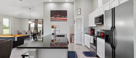 Fridge, stovetop, coffee/tea maker