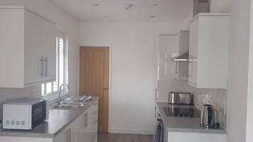 Apartment | Private kitchen | Fridge, microwave, oven, stovetop