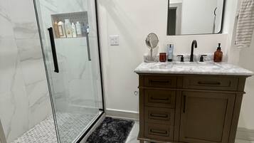 Hair dryer, towels, soap, shampoo