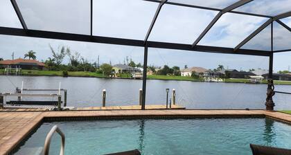A 100+ reviews Family friendly home on canal with gulf access and heated pool!