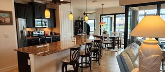A 100+ reviews Family friendly home on canal with gulf access and heated pool!